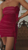 Model wearing magenta rose dress