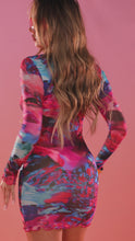 Load and play video in Gallery viewer, Model wearing abstract long sleeve mini dress 
