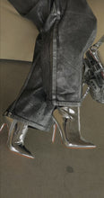 Load and play video in Gallery viewer, Model wearing silver metallic booties
