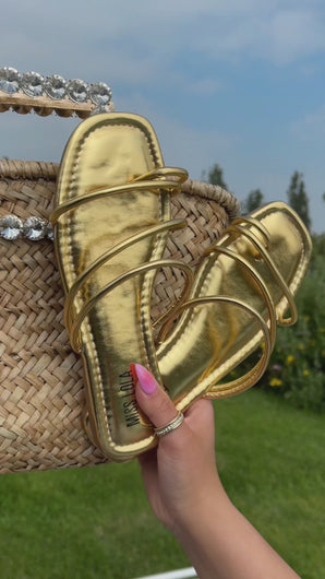 gold metallic sandals video