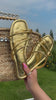 gold metallic sandals video