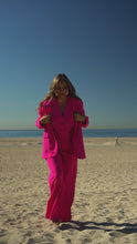 Load and play video in Gallery viewer, Video of model wearing bright pink set
