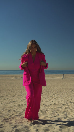 Video of model wearing bright pink set