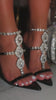 Video of black embellished heels