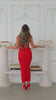 Model wearing red maxi dress video