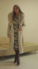 Load and play video in Gallery viewer, Video of cream trench coat on model
