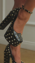 Load and play video in Gallery viewer, Video of model wearing black studded high heel platforms
