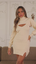 Load and play video in Gallery viewer, Video of model wearing cream knit long sleeve mini dress 

