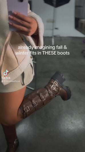 Model wearing brown boots video