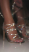 Load and play video in Gallery viewer, Model lacing up silver embellished heels video
