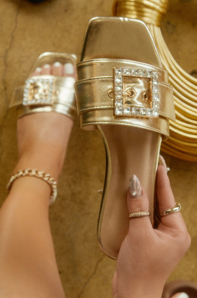 Load image into Gallery viewer, Women Holding Gold-Tone Sandals
