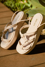 Load image into Gallery viewer, Cream Platform Sandals Laying On Wooden Floor
