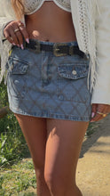Load and play video in Gallery viewer, Diamond stitching pattern denim mini skirt on model
