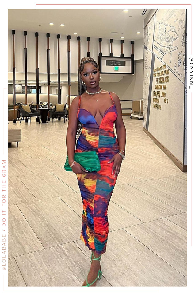 Load image into Gallery viewer, Girl Standing Wearing Colorful Dress with Green Bag and Green Shoes
