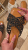 Black slip on sandals with woven strap detailing