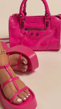 Load and play video in Gallery viewer, Model wearing pink platform flat sandals
