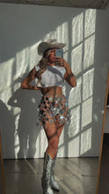 Load and play video in Gallery viewer, Model wearing star skirt in front of mirror
