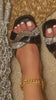 Model Wearing Black Embellished Slip-On Sandals Close Up