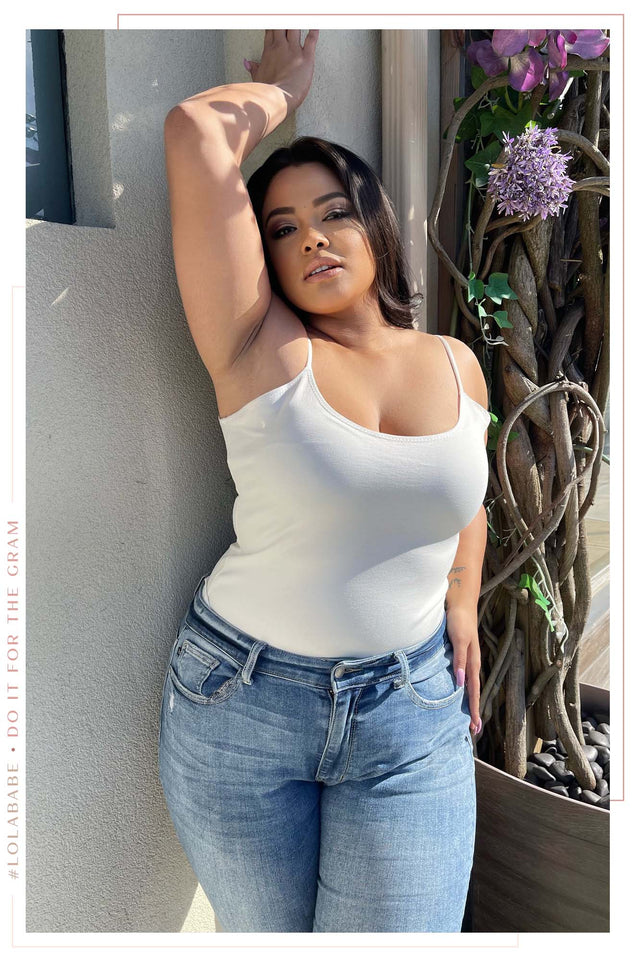 Load image into Gallery viewer, Model Wearing White Bodysuit 
