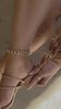 nude chunky heel with asymmetrical straps heel close up video