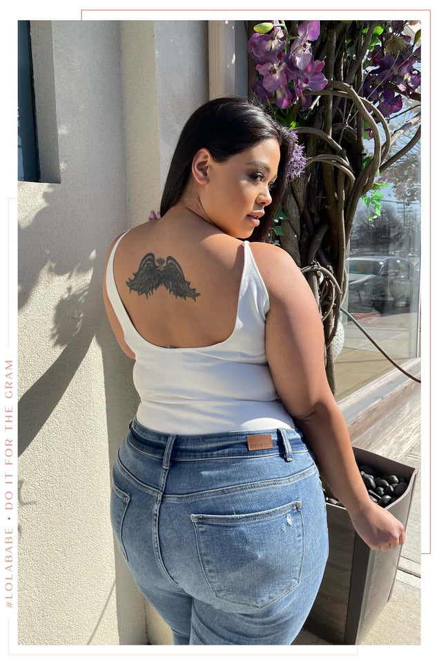 Load image into Gallery viewer, Model Showing The Back Of White Body Suit
