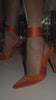 Video Of Model Wearing Orange Embellished Heels 