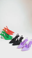 Load and play video in Gallery viewer, Video Of Model Wearing Shoes In Orange, Lavender, Black, And Green
