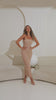 nude mesh midi dress on model 