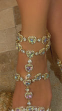 Load and play video in Gallery viewer, Model Wearing Heart Stone Embellishments Lobster Claw Closure Gold Flat Sandals
