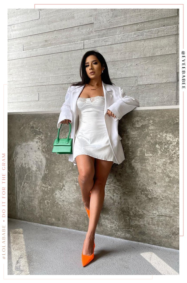 Load image into Gallery viewer, White Dress Styled With White Blazer And Orange Heels
