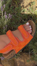 Load and play video in Gallery viewer, Orange strap sandals on model video
