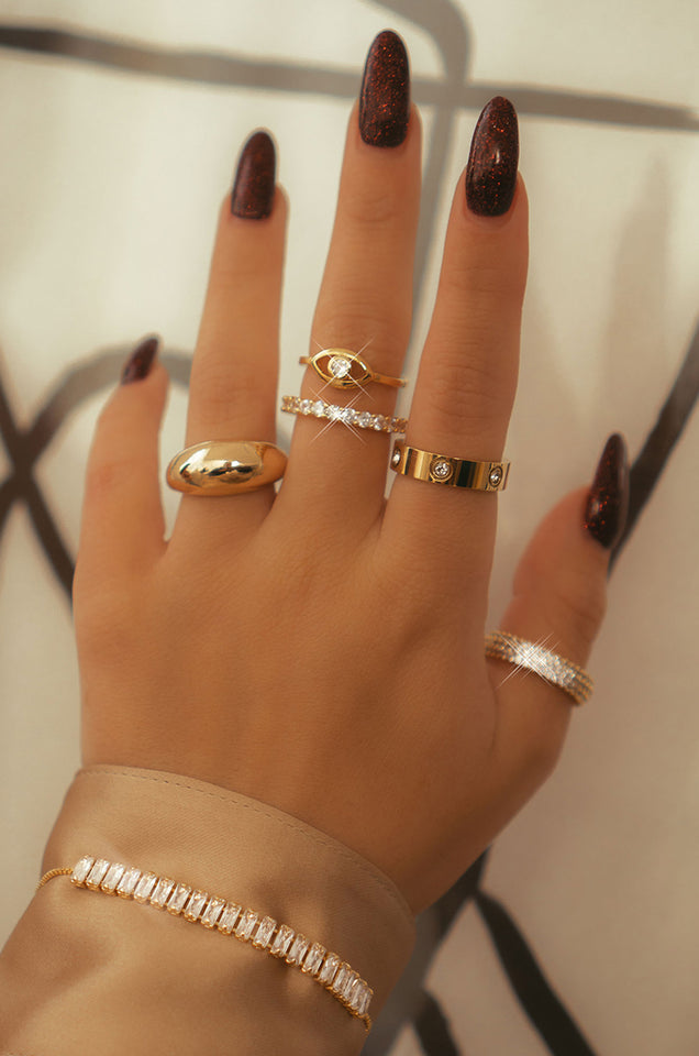 Load image into Gallery viewer, Women Wearing Multiple Gold-Tone Rings

