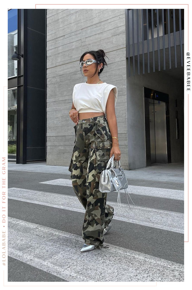 Load image into Gallery viewer, Women Standing with Silver-Tone Handbag
