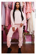 Load image into Gallery viewer, Women Standing in Light Pink Sweat Pant and Crewneck
