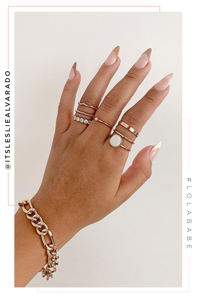 Load image into Gallery viewer, Woman Wearing Gold Tone Bracelet
