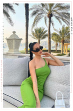 Load image into Gallery viewer, Influencer Sitting Wearing Green Stretch Dress
