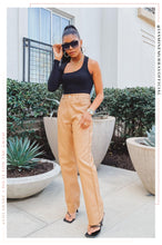 Load image into Gallery viewer, Woman Wearing Black Bodysuit With Camel Pants
