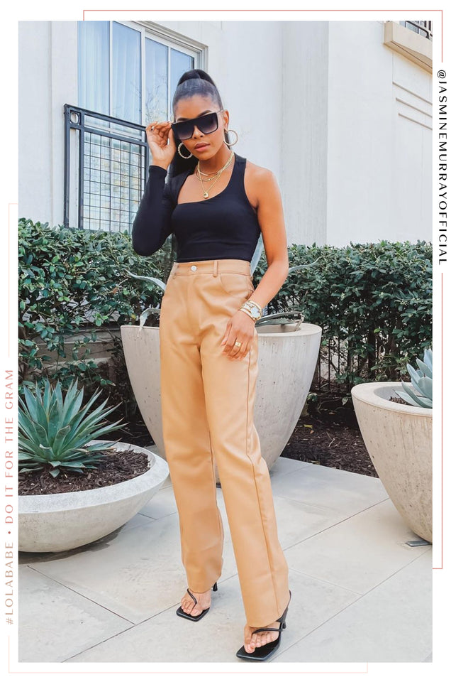Load image into Gallery viewer, Woman Wearing Black Bodysuit With Camel Pants

