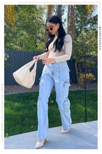 Load image into Gallery viewer, Women Walking With Denim Pants
