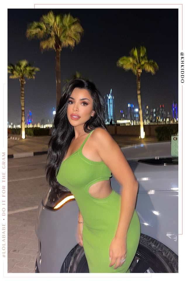 Load image into Gallery viewer, Girl Standing in Front of Car Wearing Green Dress
