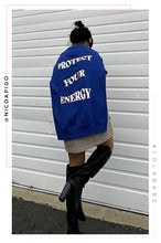 Load image into Gallery viewer, woman stand backward wearing blue long sleeve oversized protect your energy crewneck 

