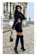 Load image into Gallery viewer, woman standing wearing long sleeve open back mini knitted dress 
