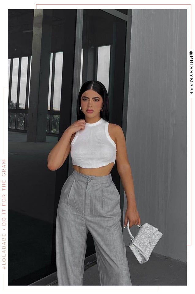 Load image into Gallery viewer, Model Standing Wearing White Crop Top
