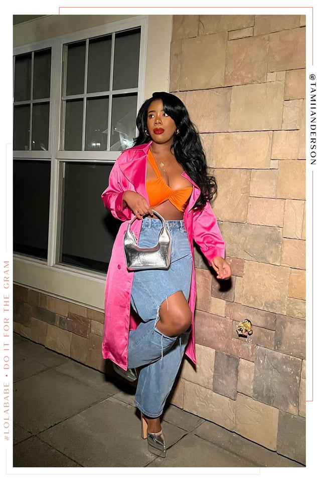Load image into Gallery viewer, Lady Standing Wearing Pink Satin Coat
