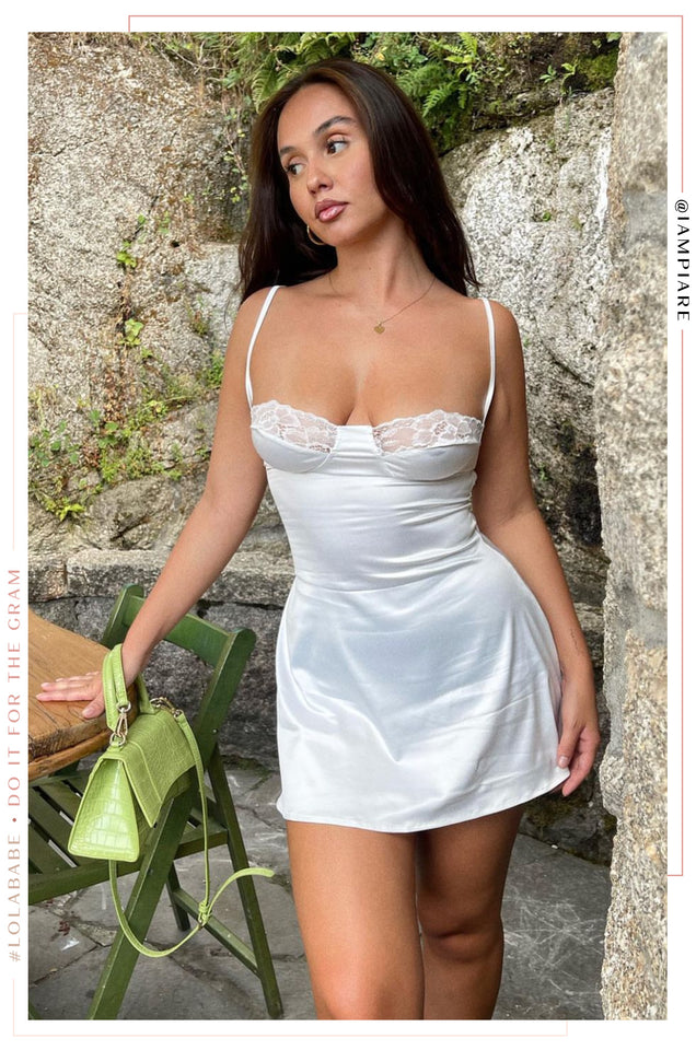 Load image into Gallery viewer, Woman Wearing WHite Mini Dress
