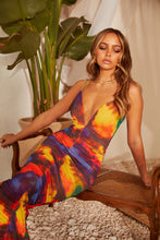 Load image into Gallery viewer, Model Sitting Wearing Colorful Abstract Ruched Dress
