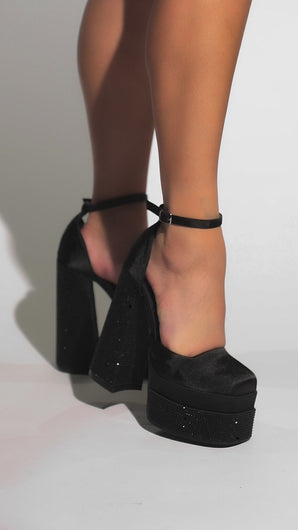 Video Of Model Wearing Embellished Platform Heels 