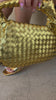 gold block heel close up video with matching bag