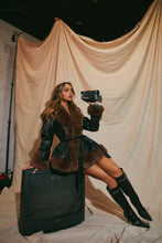 Load image into Gallery viewer, Model Sitting on TV Wearing Jacket as a Dress
