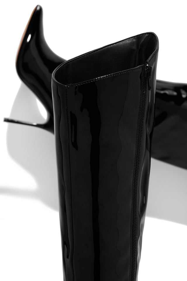 Load image into Gallery viewer, black boot with inward zipper closure 
